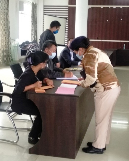 Officials and personnel for election duty cast votes through postal ballots at DPDB Conference Hall, Deputy Commissioner's Office Complex, Kohima on October 31. (DIPR Photo)